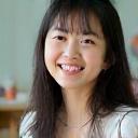 Photo of Ai Sato, a young woman smiling warmly.